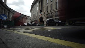 Red Double-Decker Bus Motion Blur on Regent Street, London