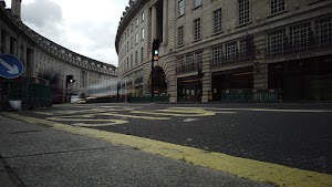 Red Double-Decker Bus Motion Blur on Regent Street, London