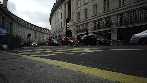 Red Double-Decker Bus Motion Blur on Regent Street, London