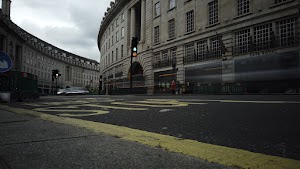 Red Double-Decker Bus Motion Blur on Regent Street, London