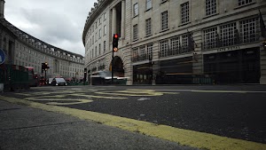 Red Double-Decker Bus Motion Blur on Regent Street, London