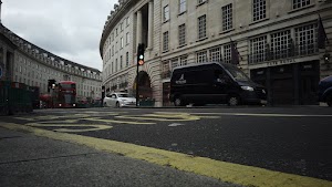 Red Double-Decker Bus Motion Blur on Regent Street, London