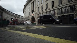 Red Double-Decker Bus Motion Blur on Regent Street, London