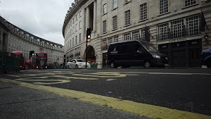 Red Double-Decker Bus Motion Blur on Regent Street, London