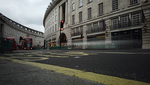 Red Double-Decker Bus Motion Blur on Regent Street, London