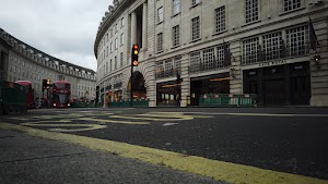 Red Double-Decker Bus Motion Blur on Regent Street, London