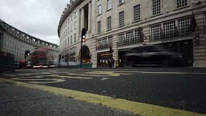Red Double-Decker Bus Motion Blur on Regent Street, London