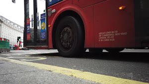 Red Double-Decker Bus Motion Blur on Regent Street, London