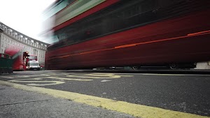 Red Double-Decker Bus Motion Blur on Regent Street, London