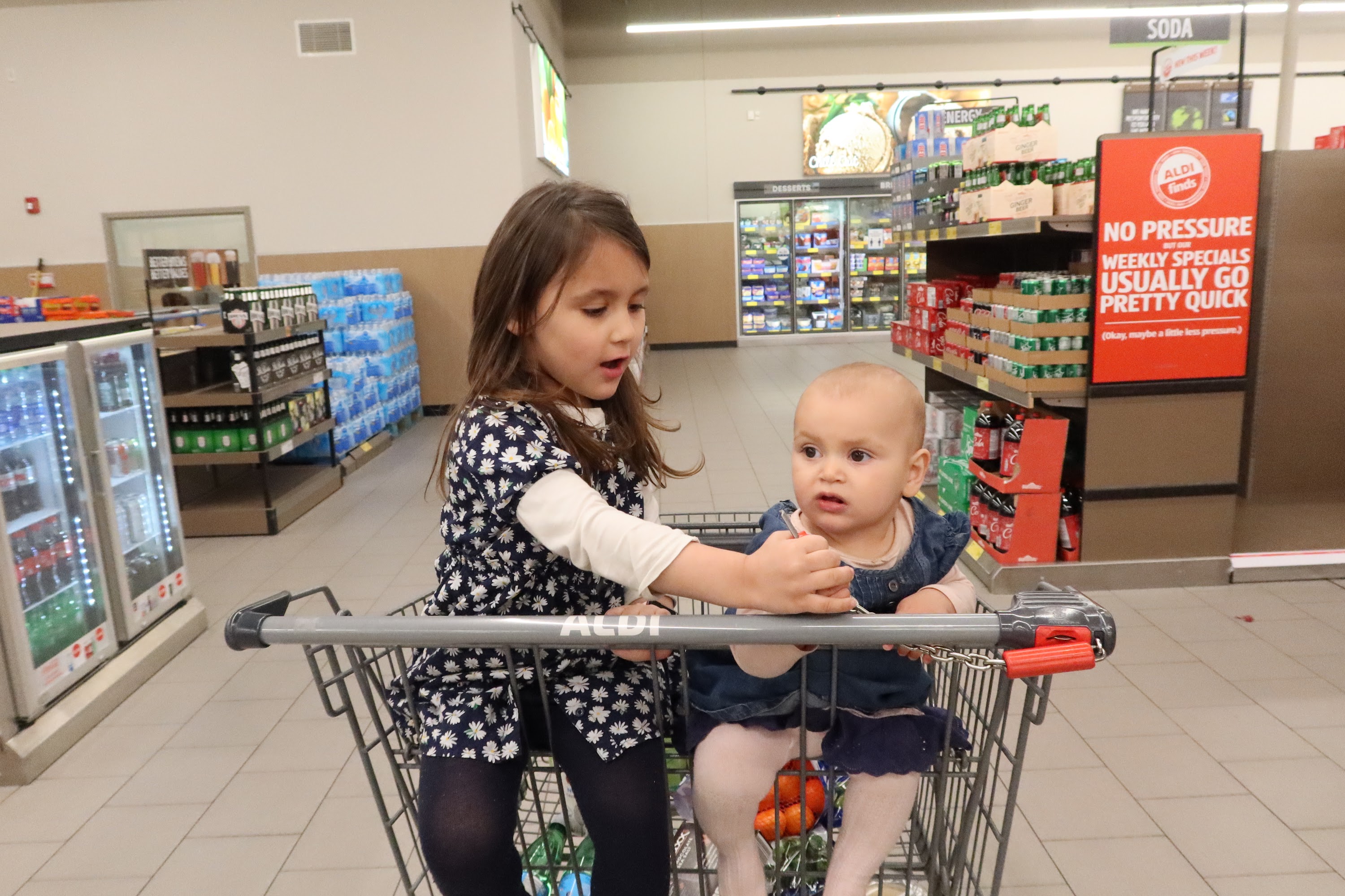 Two Girls Shopping at Aldi Grocery Store
