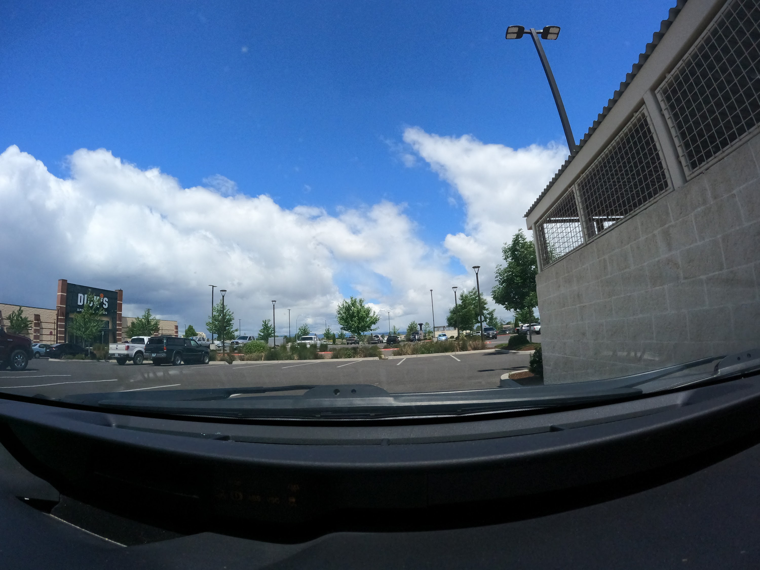 Suburban Intersection with Construction Signage — Dashcam View