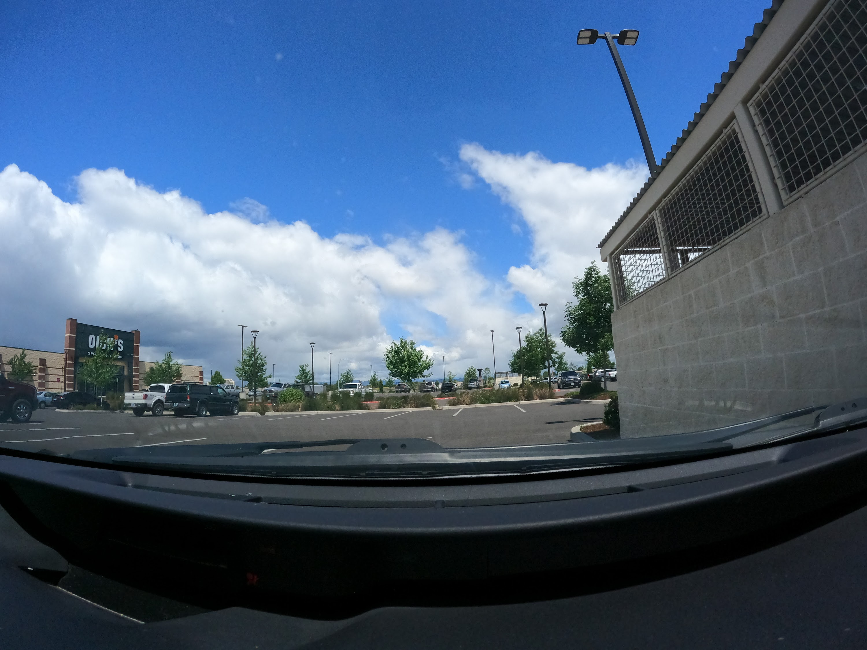 Suburban Intersection with Construction Signage — Dashcam View