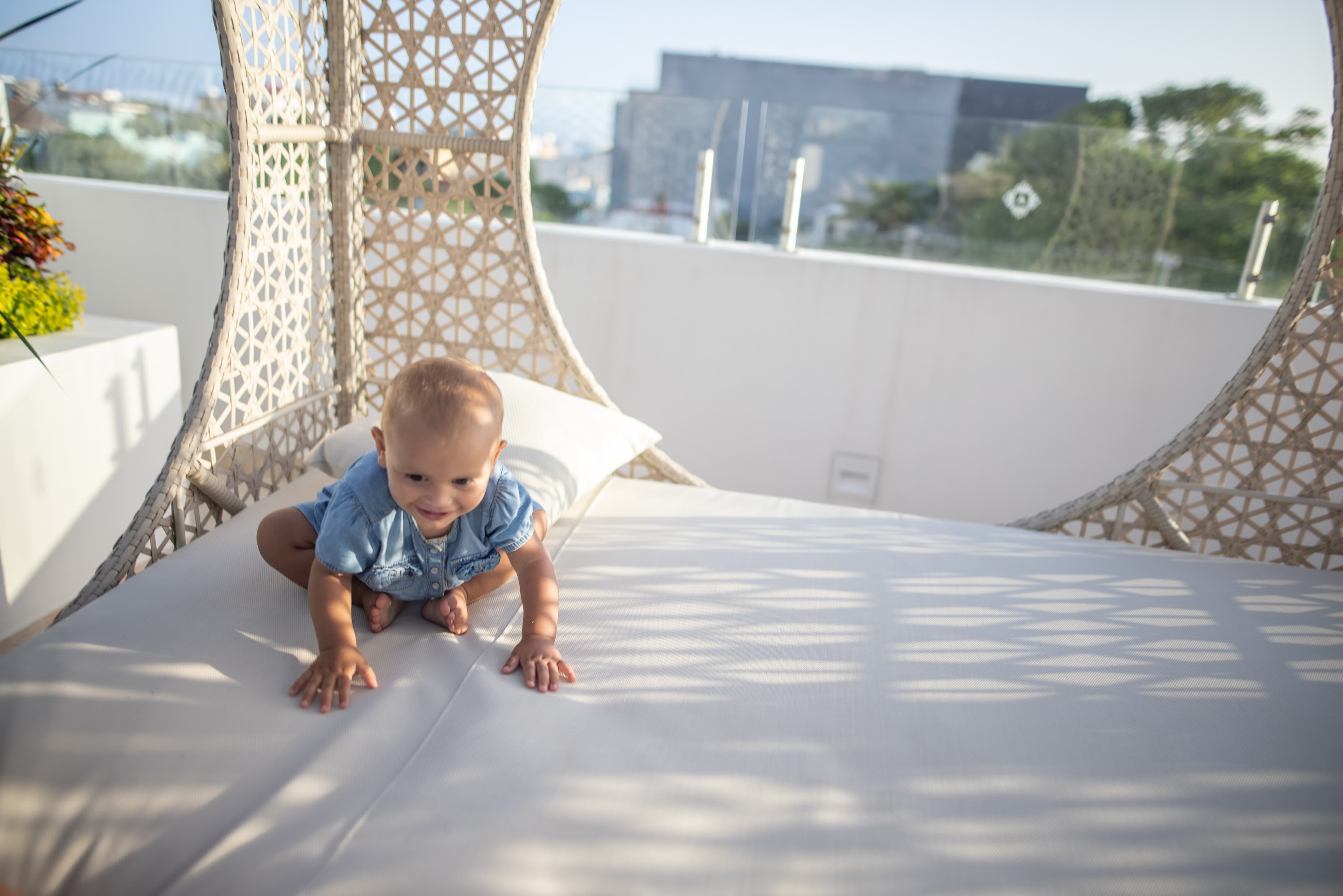 Baby Crawling on Rooftop Daybed