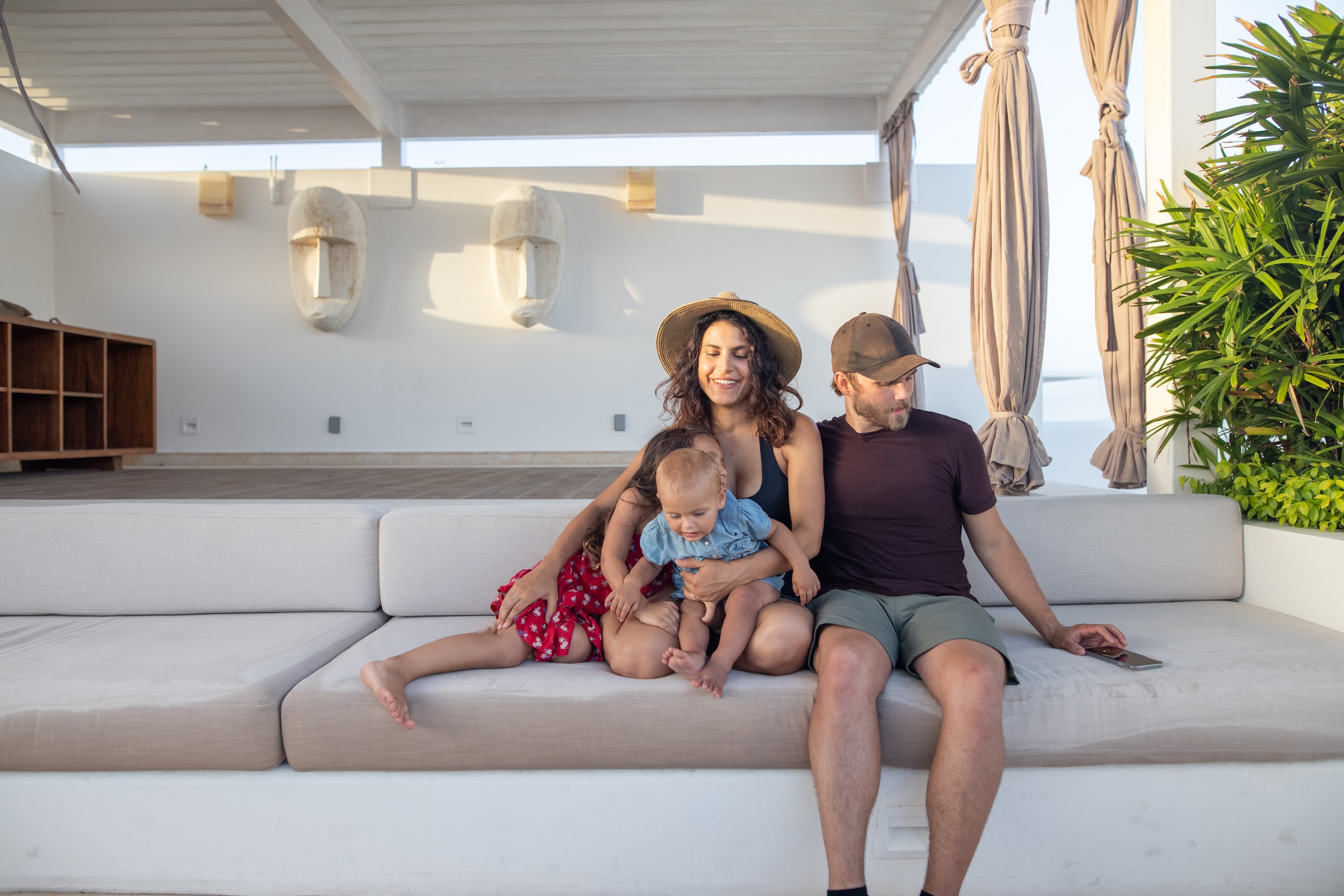 Family of Four Relaxing on Outdoor Patio
