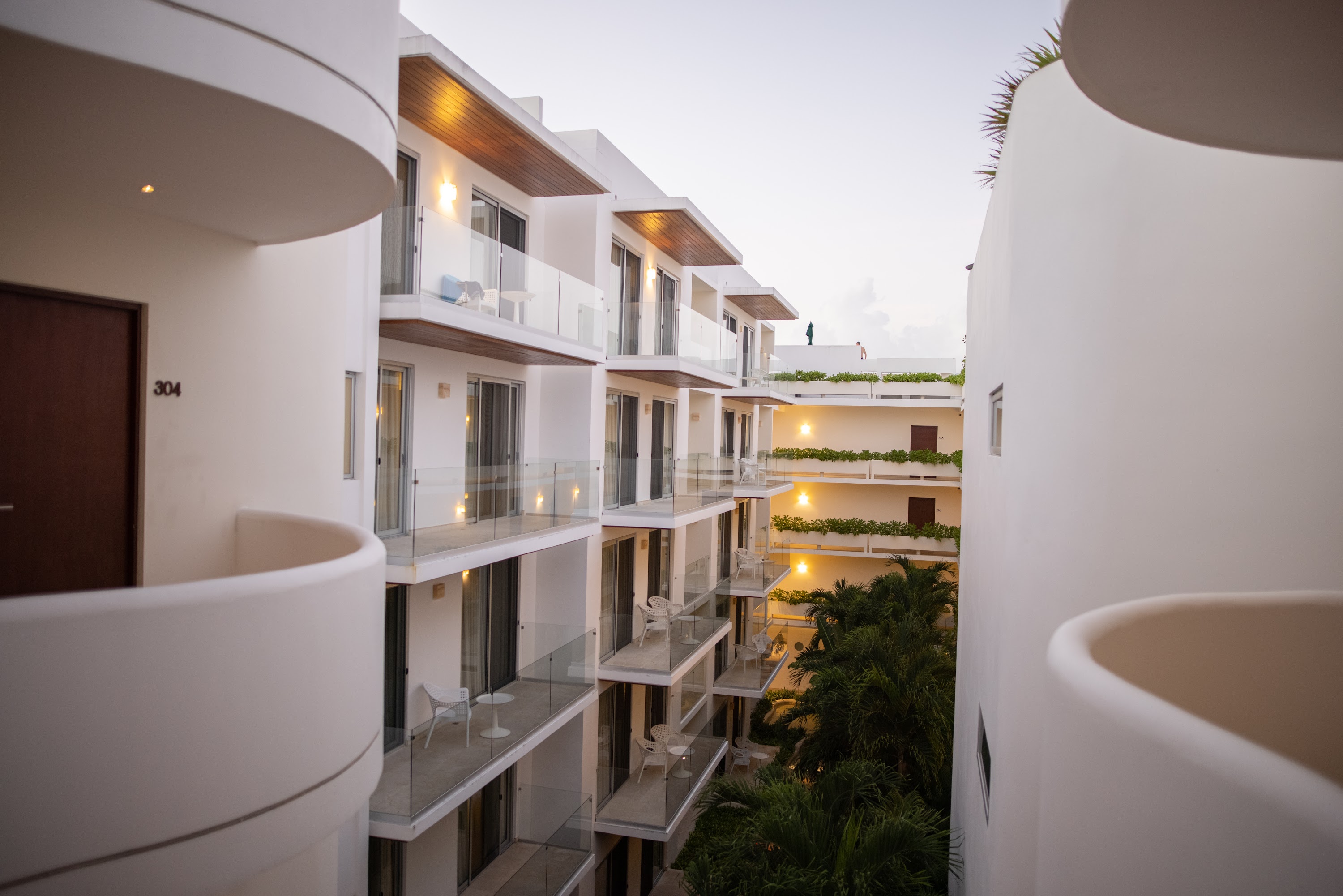 Modern White Apartment Complex at Dusk
