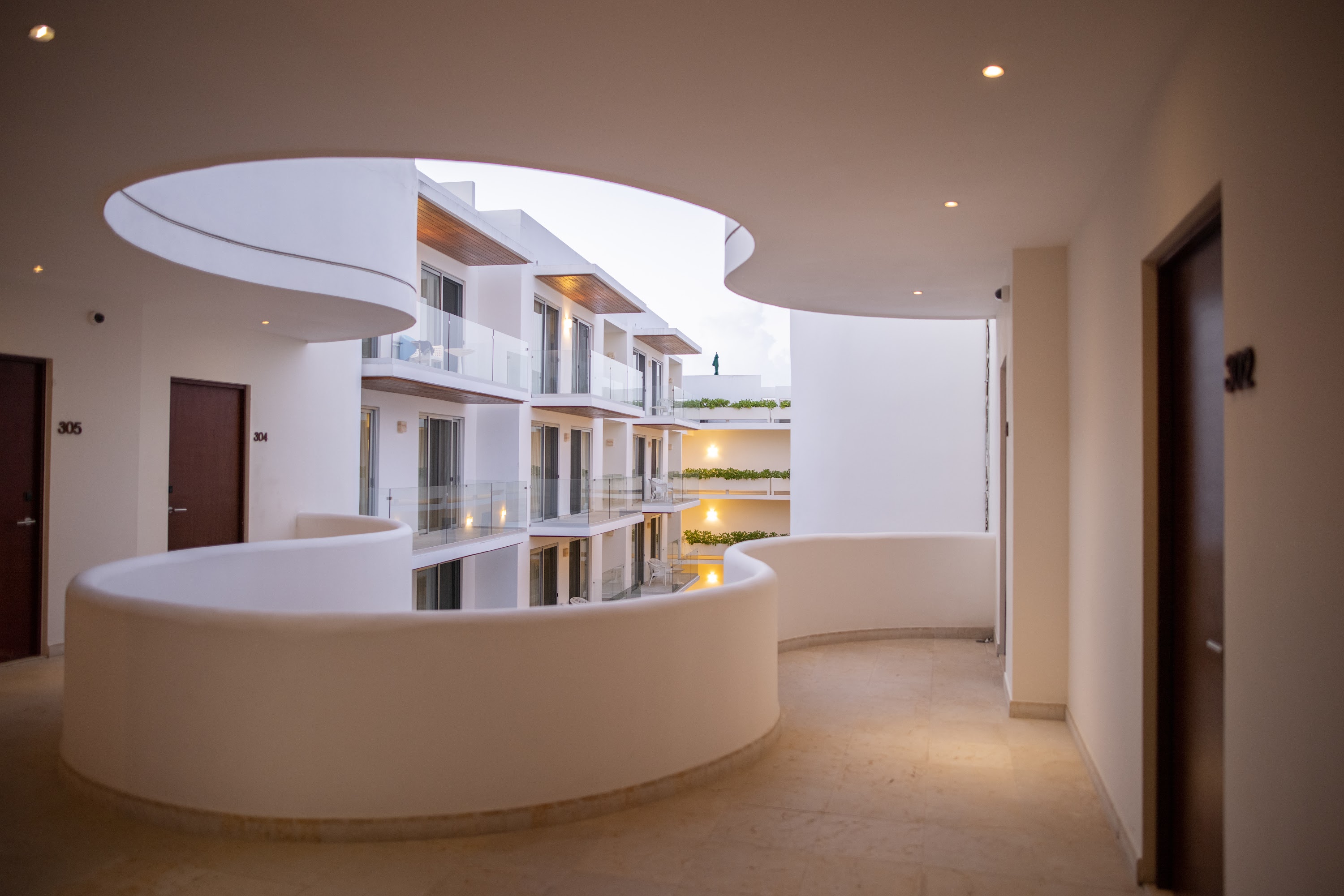 Modern Architectural Courtyard with Curved White Structures