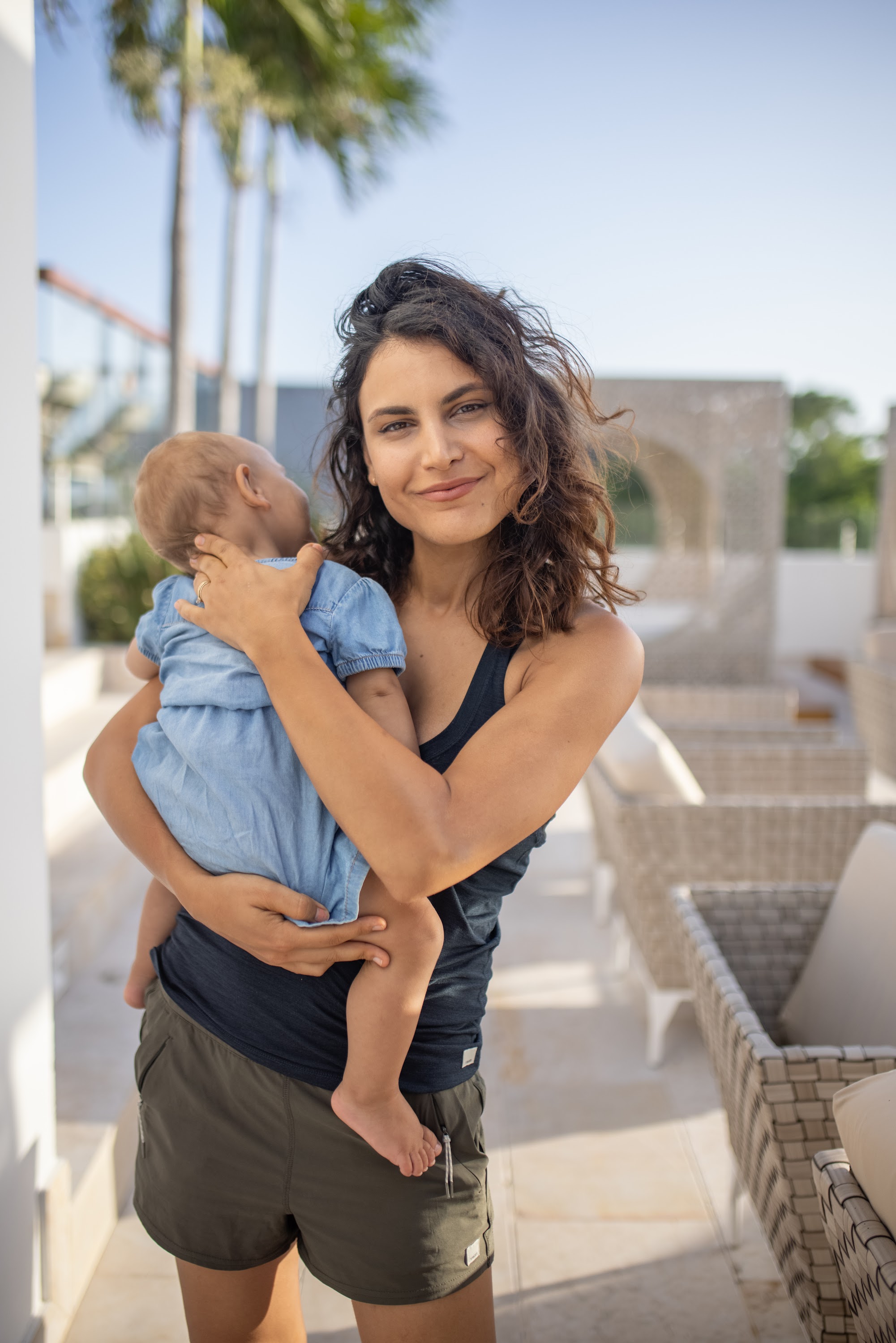 Mother Holding Baby Outdoors