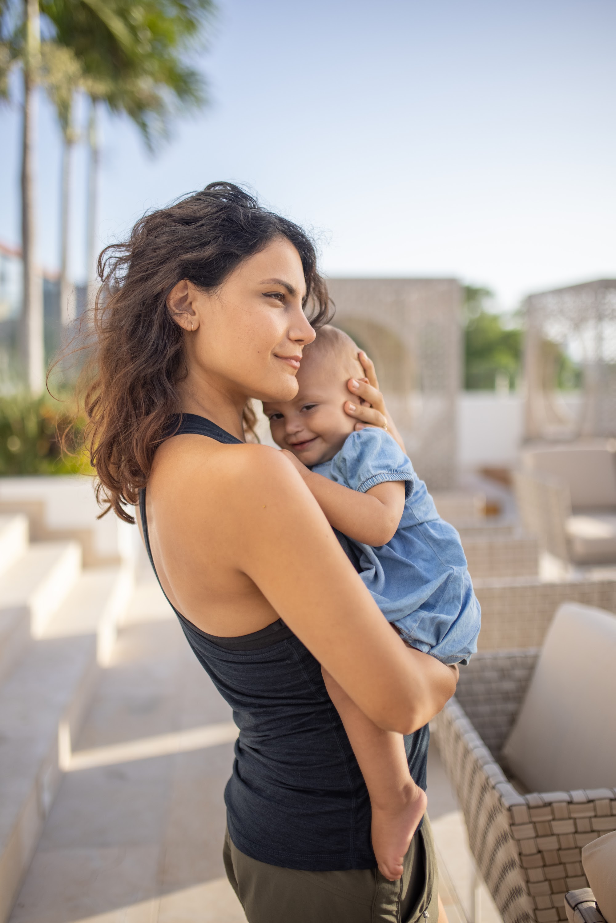 Mother Holding Baby Outdoors