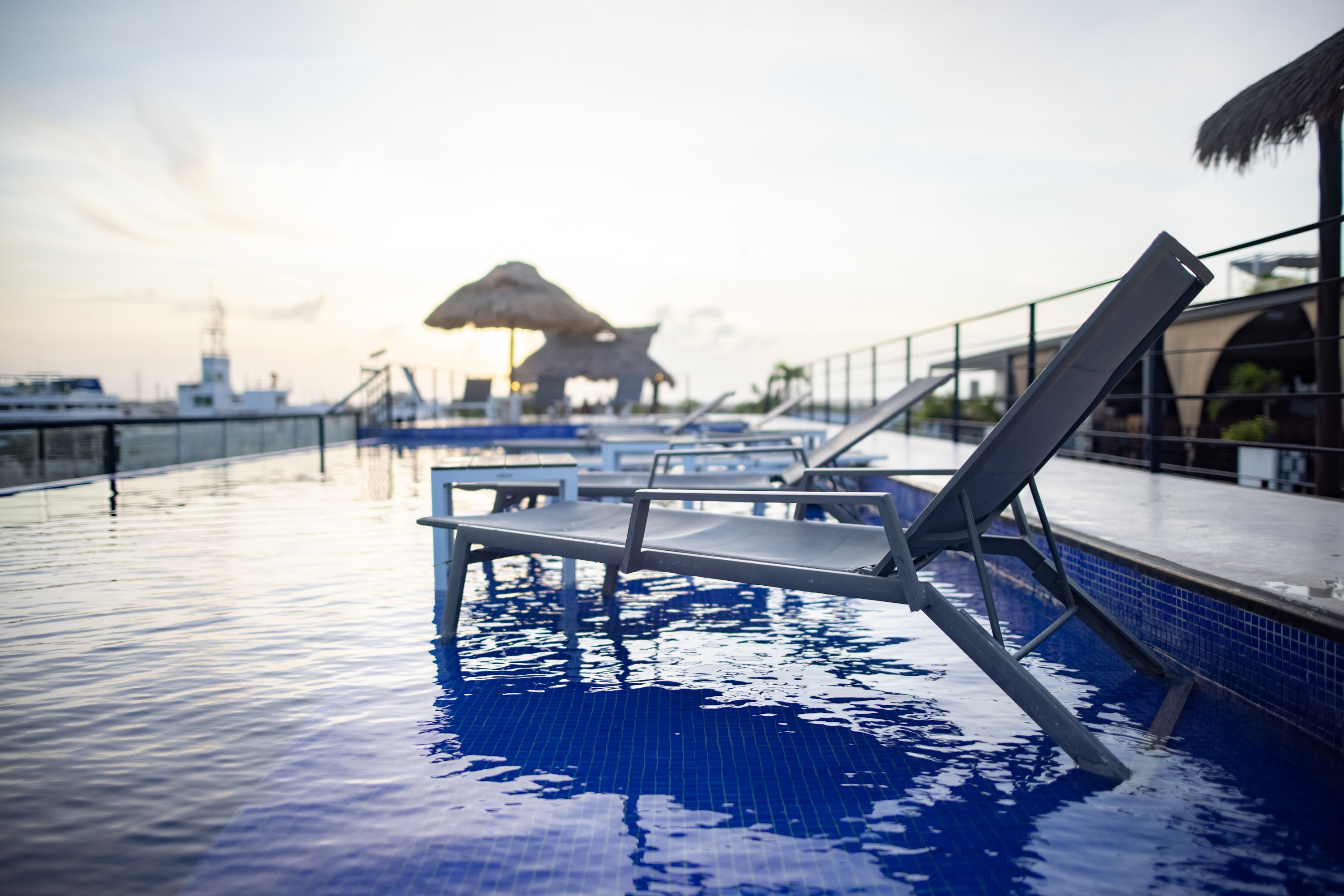 Infinity Pool Lounge at Sunset