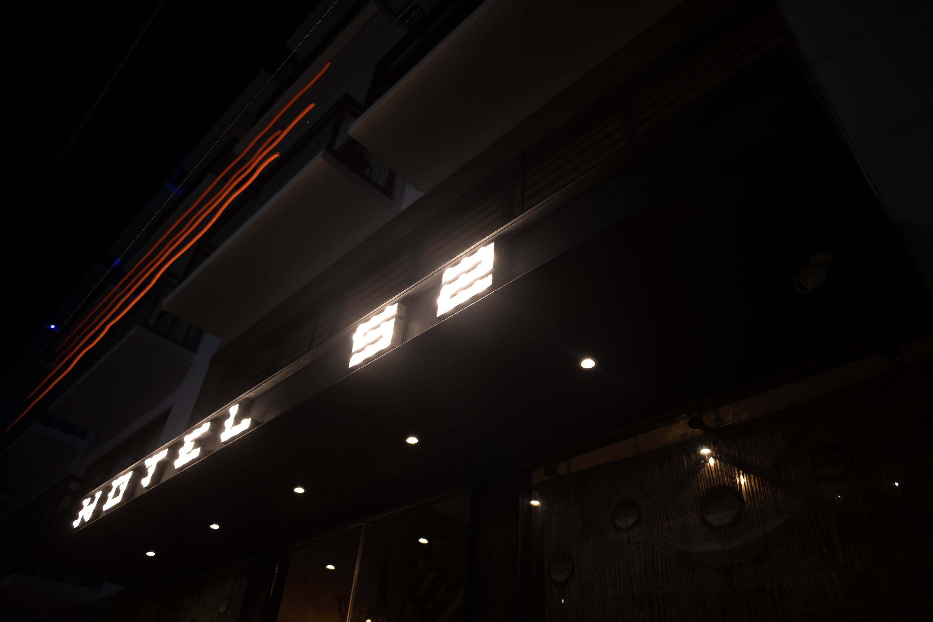 Nighttime Hotel Sign Illuminated