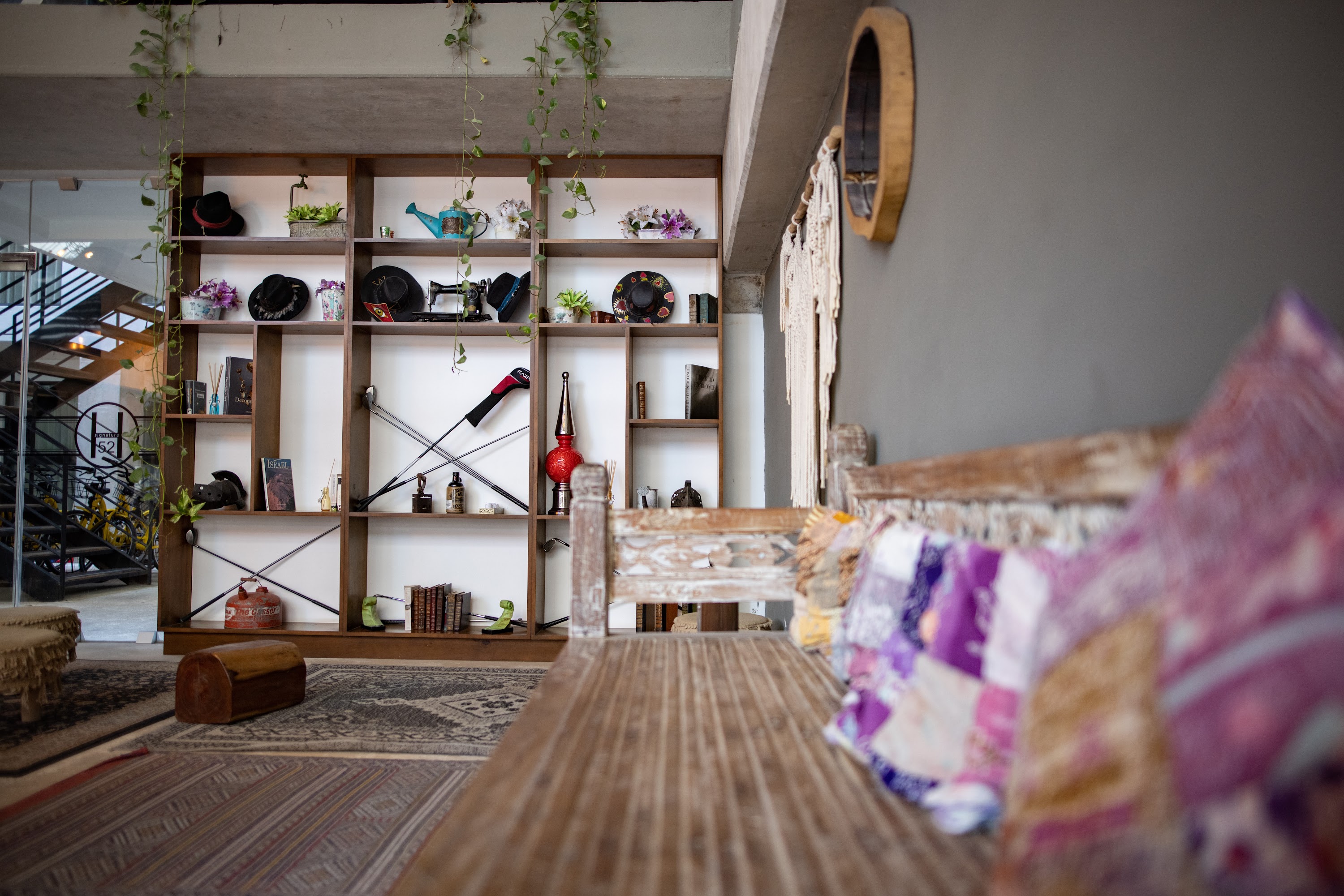 Bohemian Interior with Wooden Bench and Decorative Shelf
