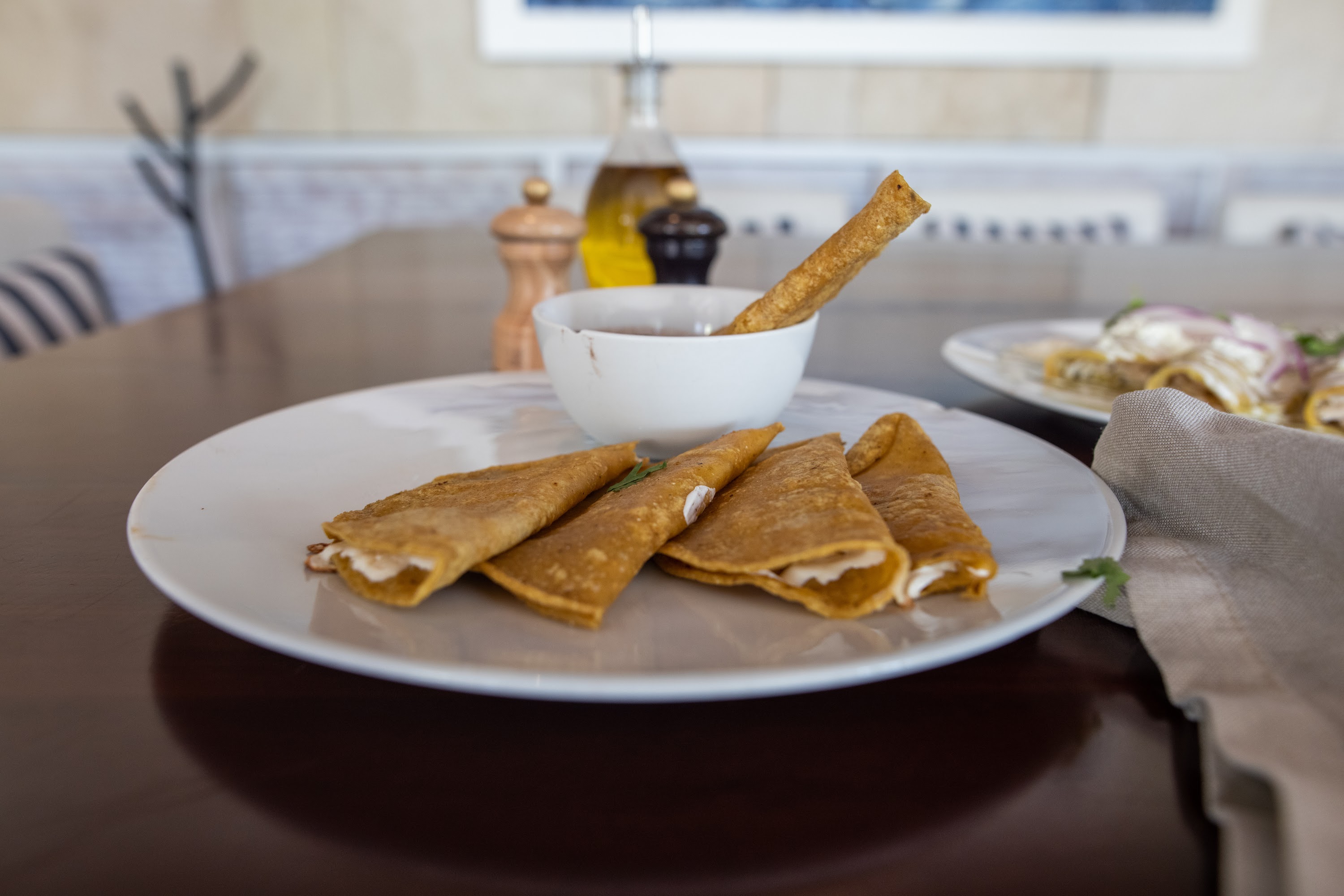 Tortillas with Dip on a Wooden Table