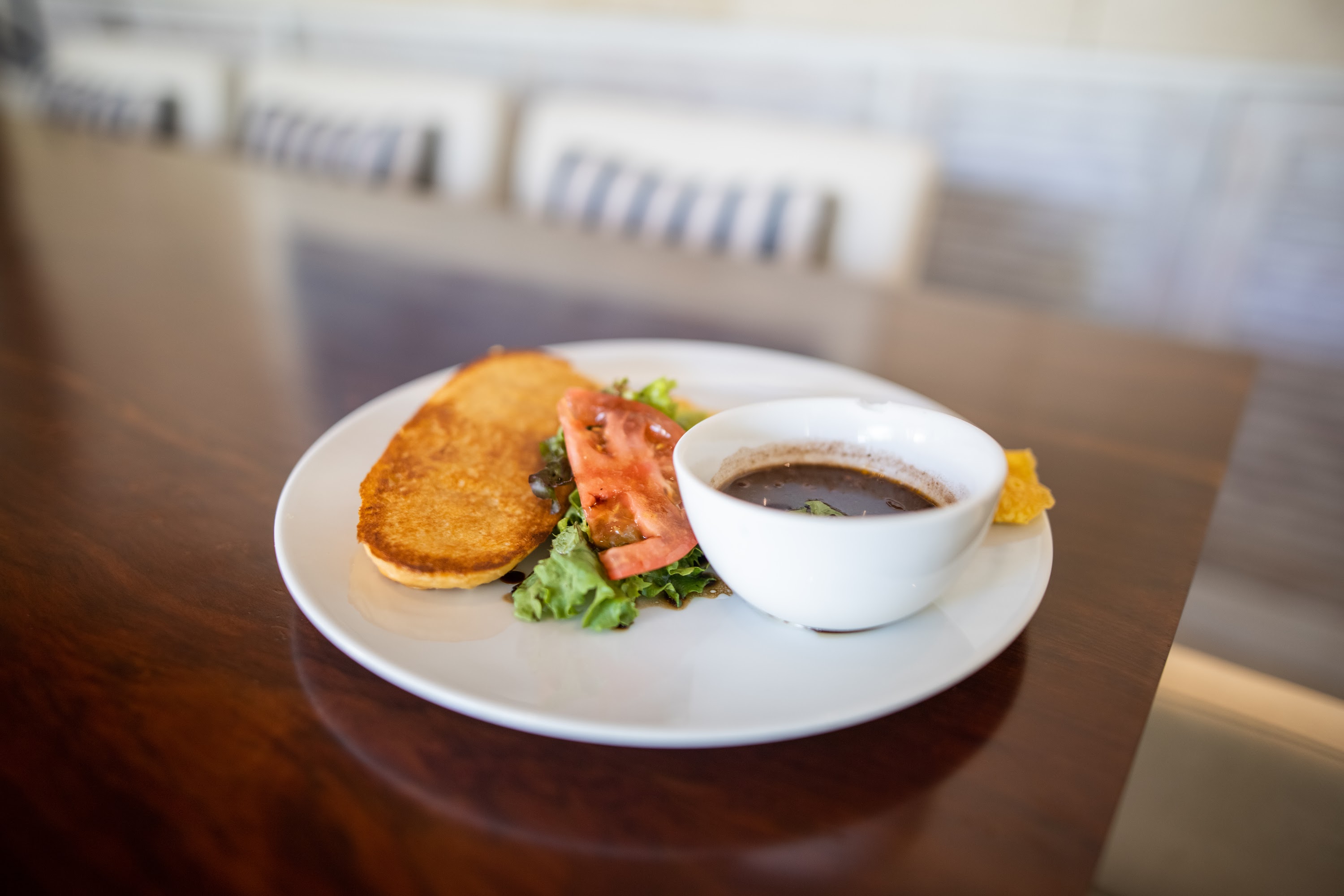 Plate of Cornbread with Salad and Sauce
