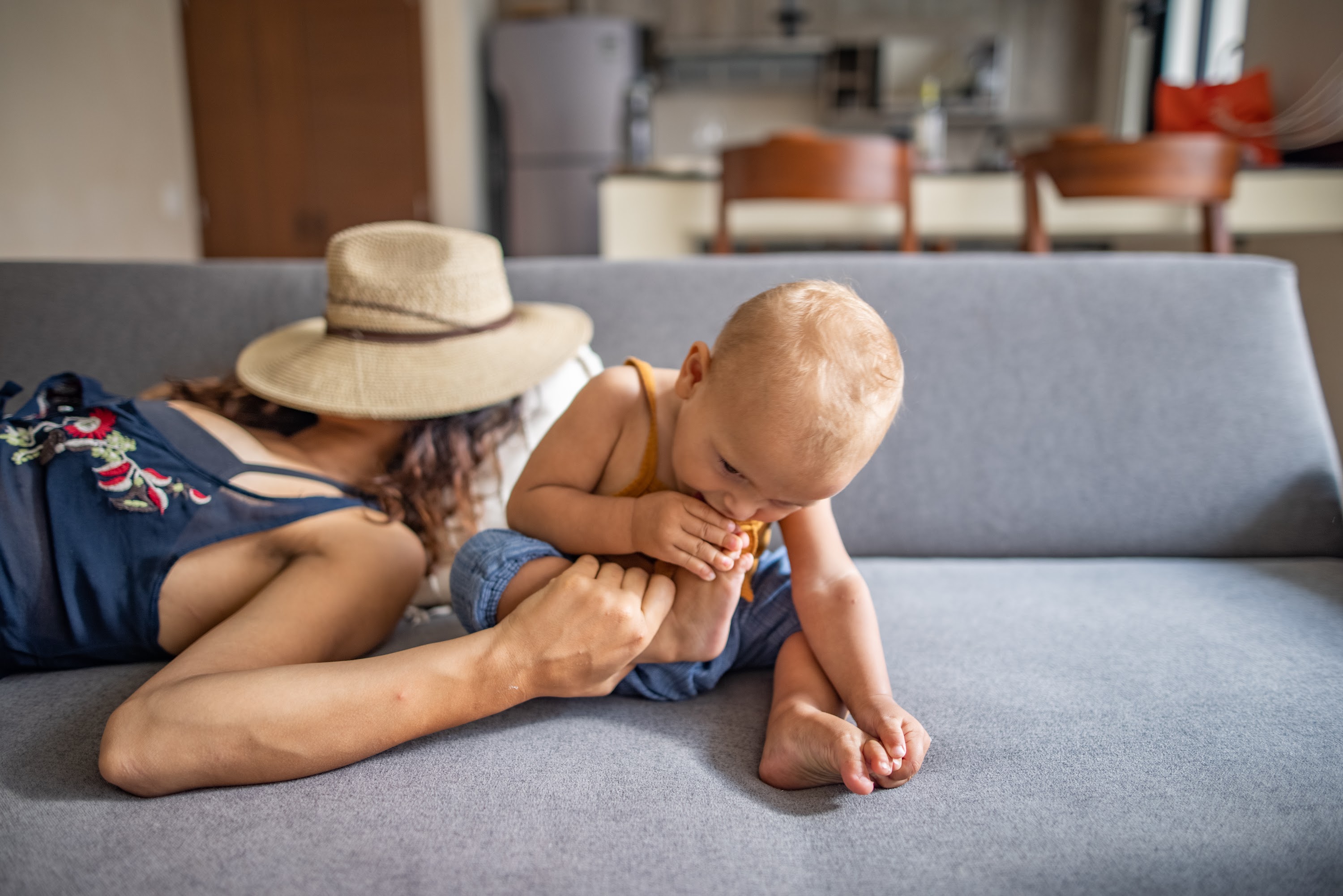 Mother and Baby Relaxing on Couch