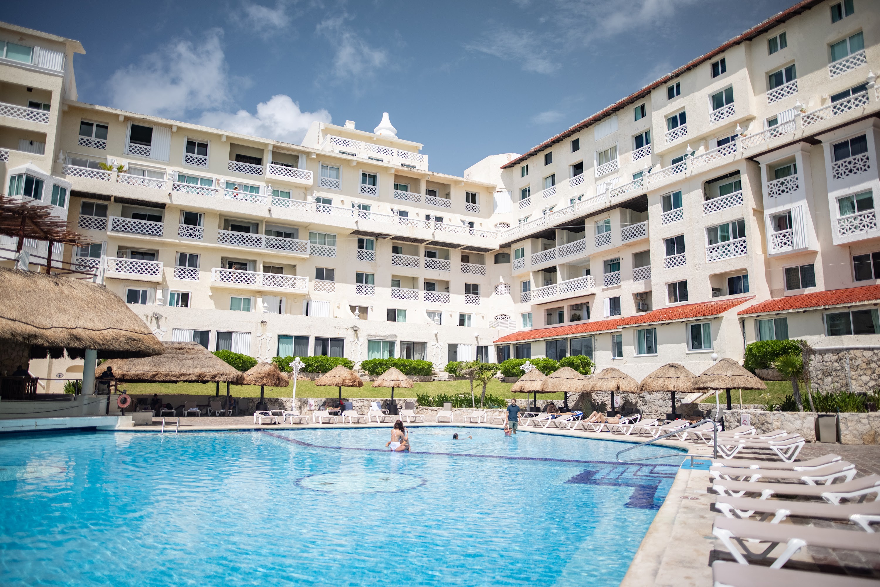 Resort Pool Area with Guest Relaxing
