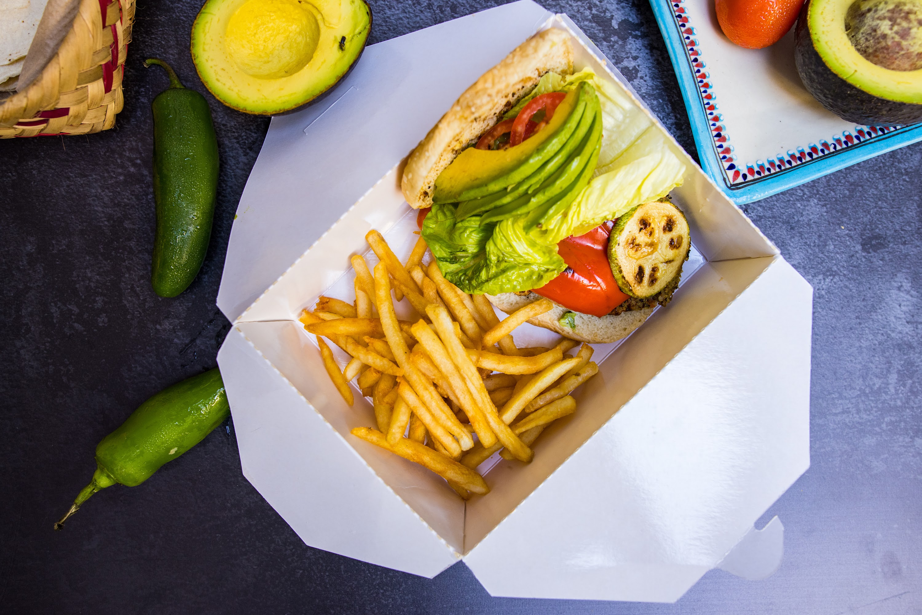 Avocado Burger with Fries and Fresh Ingredients
