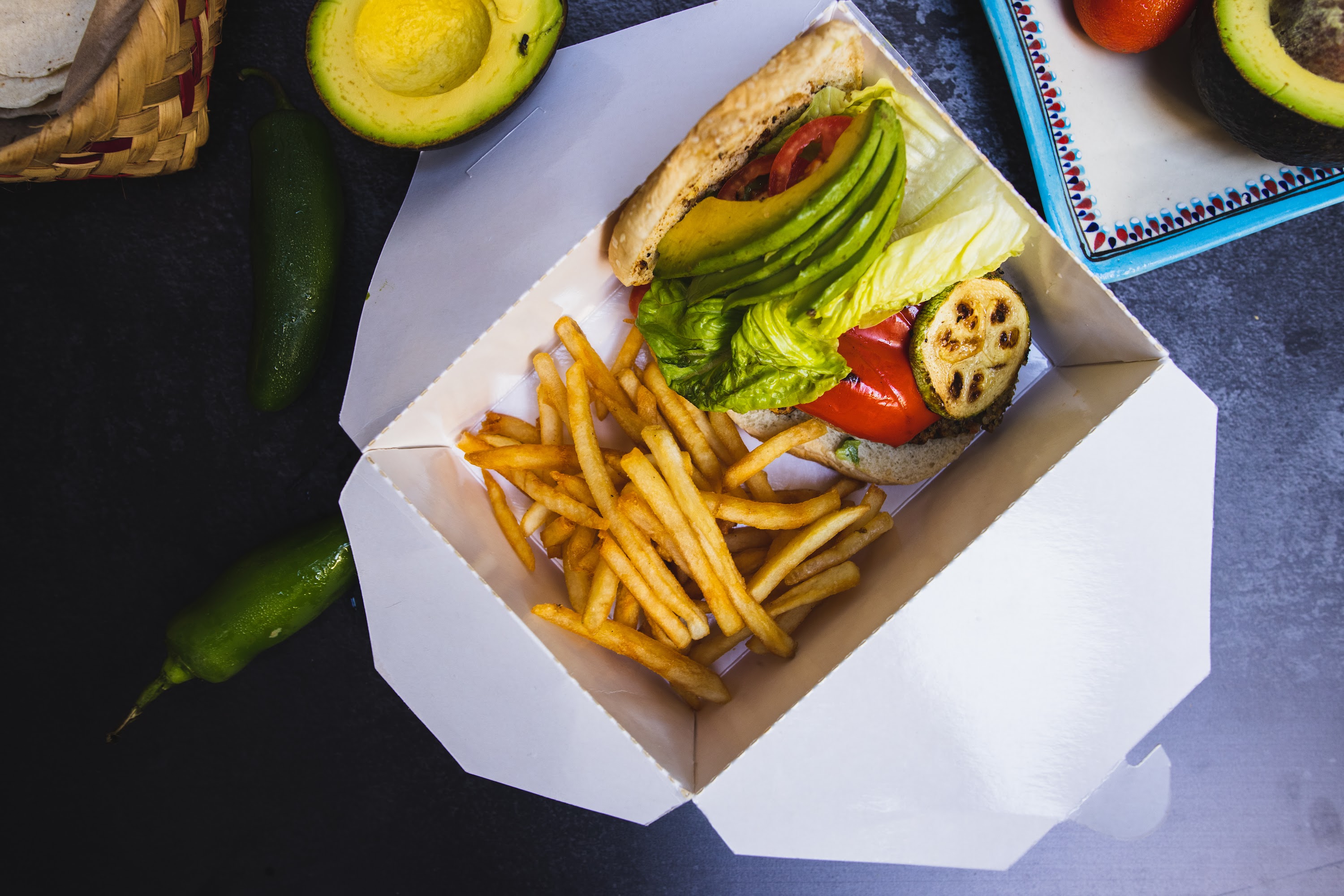 Avocado Burger with Fries and Fresh Ingredients