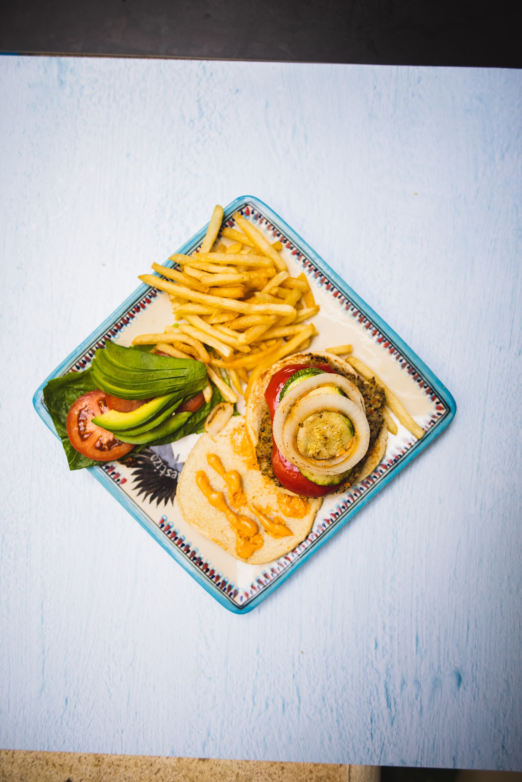 Burger with Fries and Avocado Sides