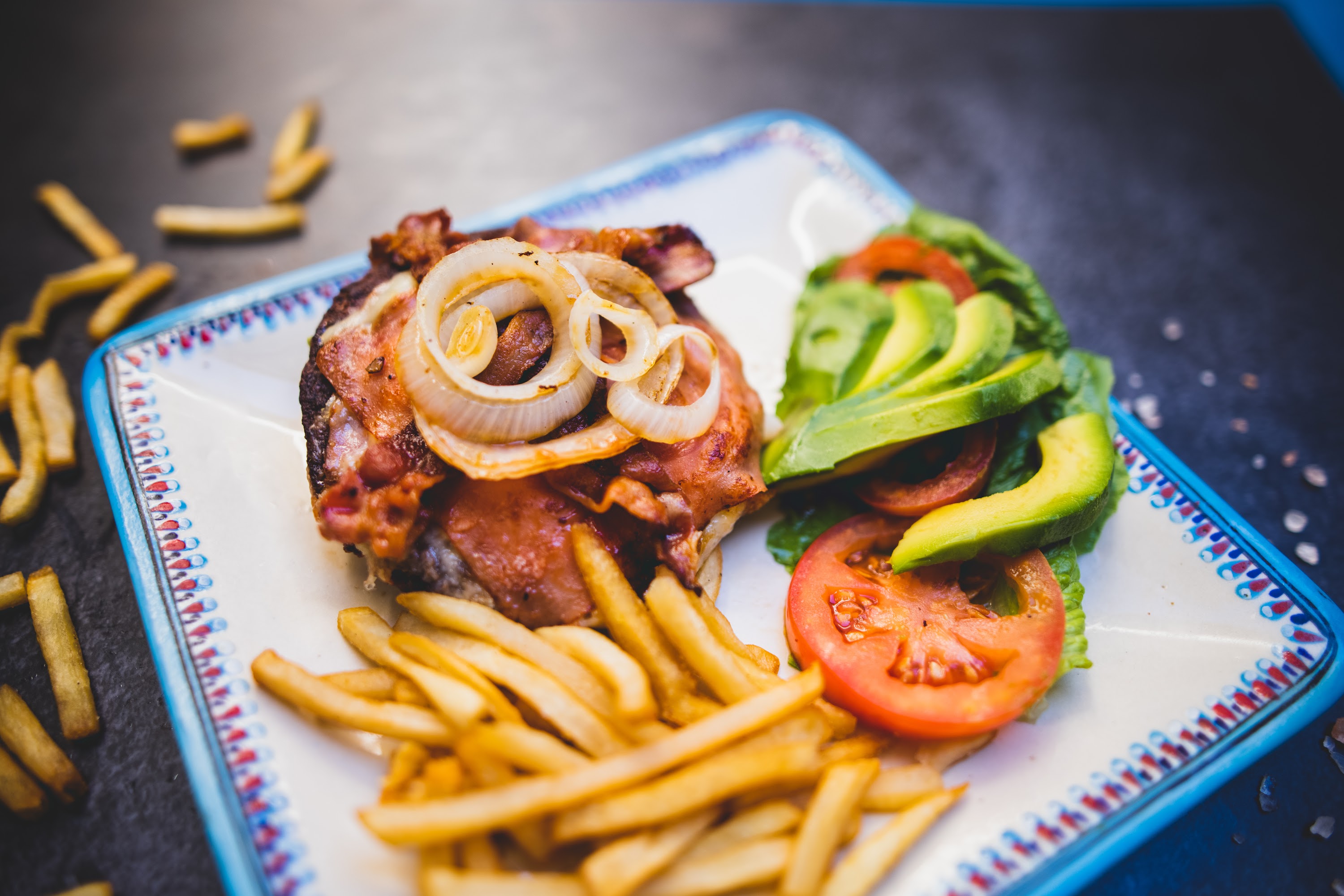Bacon Cheeseburger with Fries and Avocado Sides