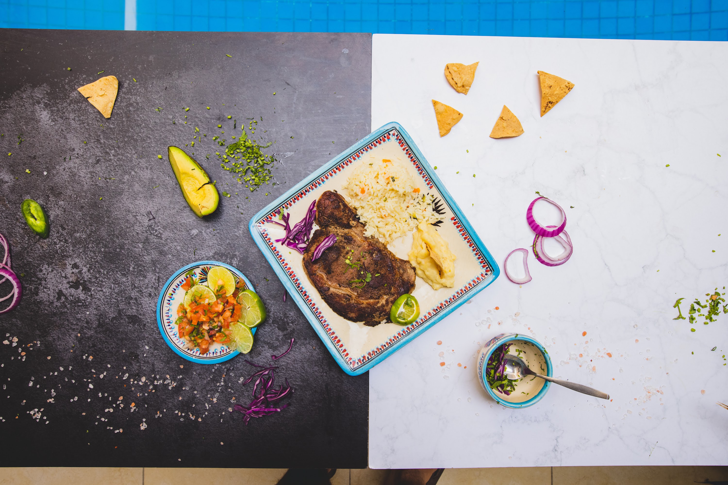 Overhead Shot of Mexican-Style Steak Meal with Garnishes