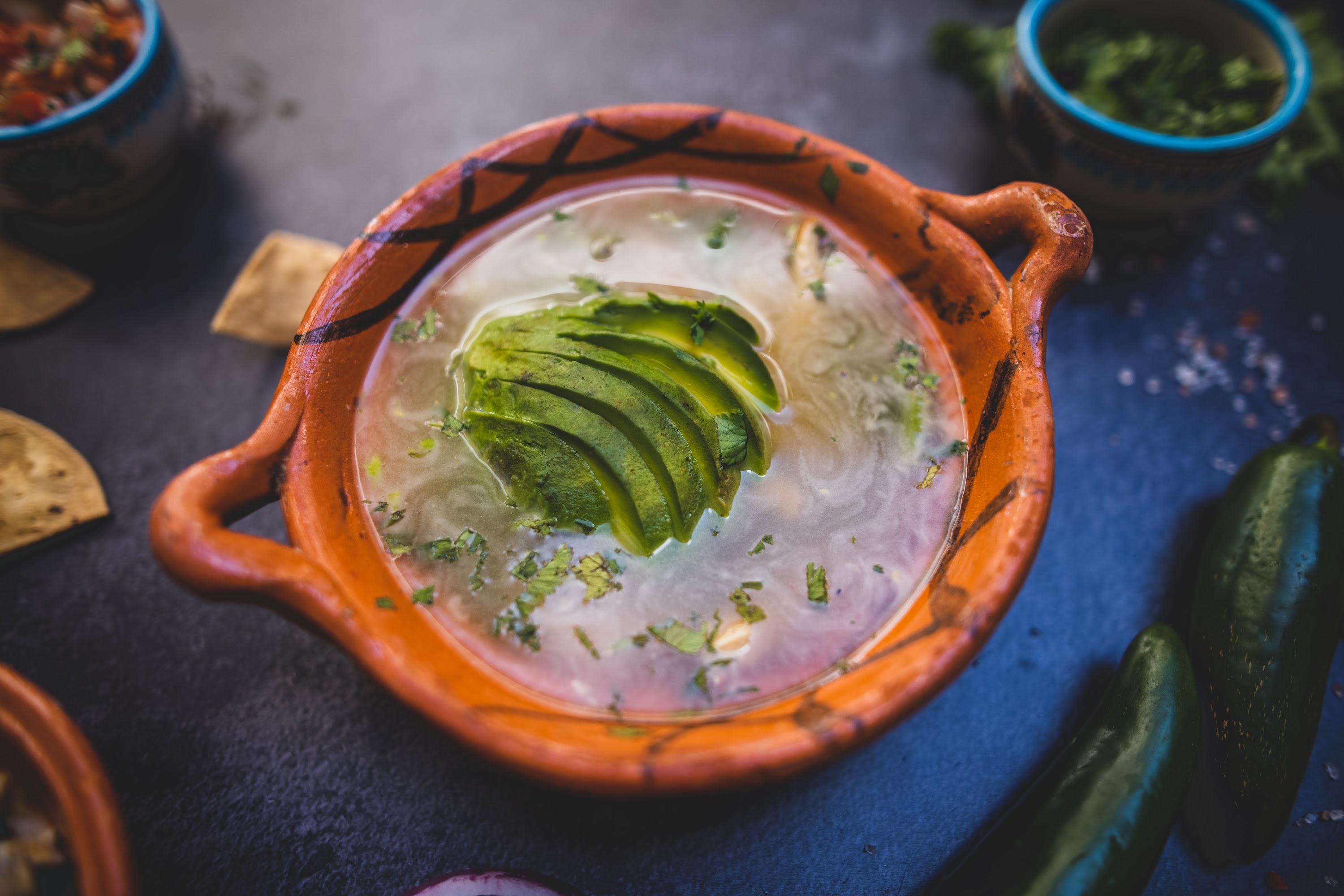 Mexican Avocado Soup in Terracotta Bowl