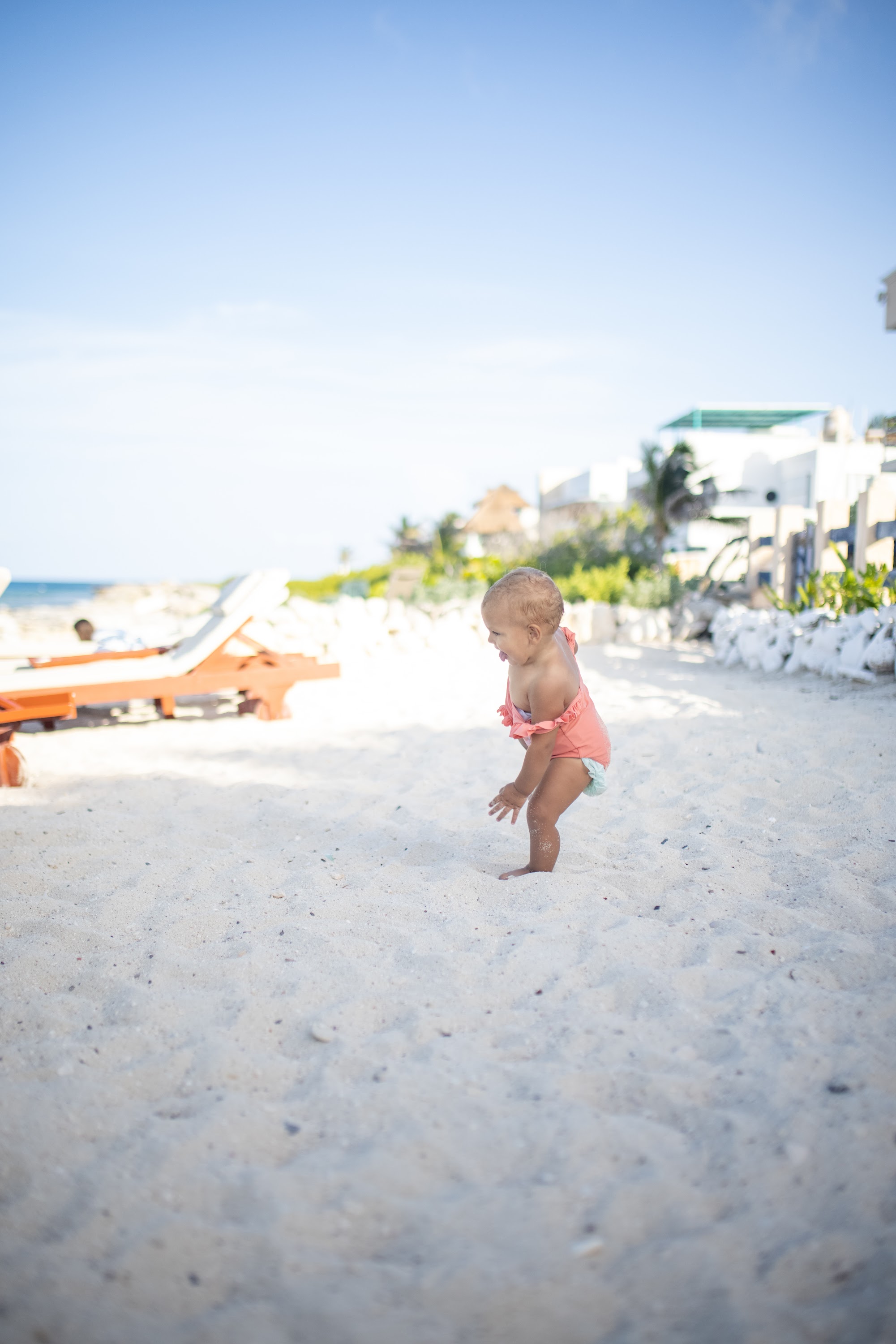 Baby on Beach Playing in Sand
