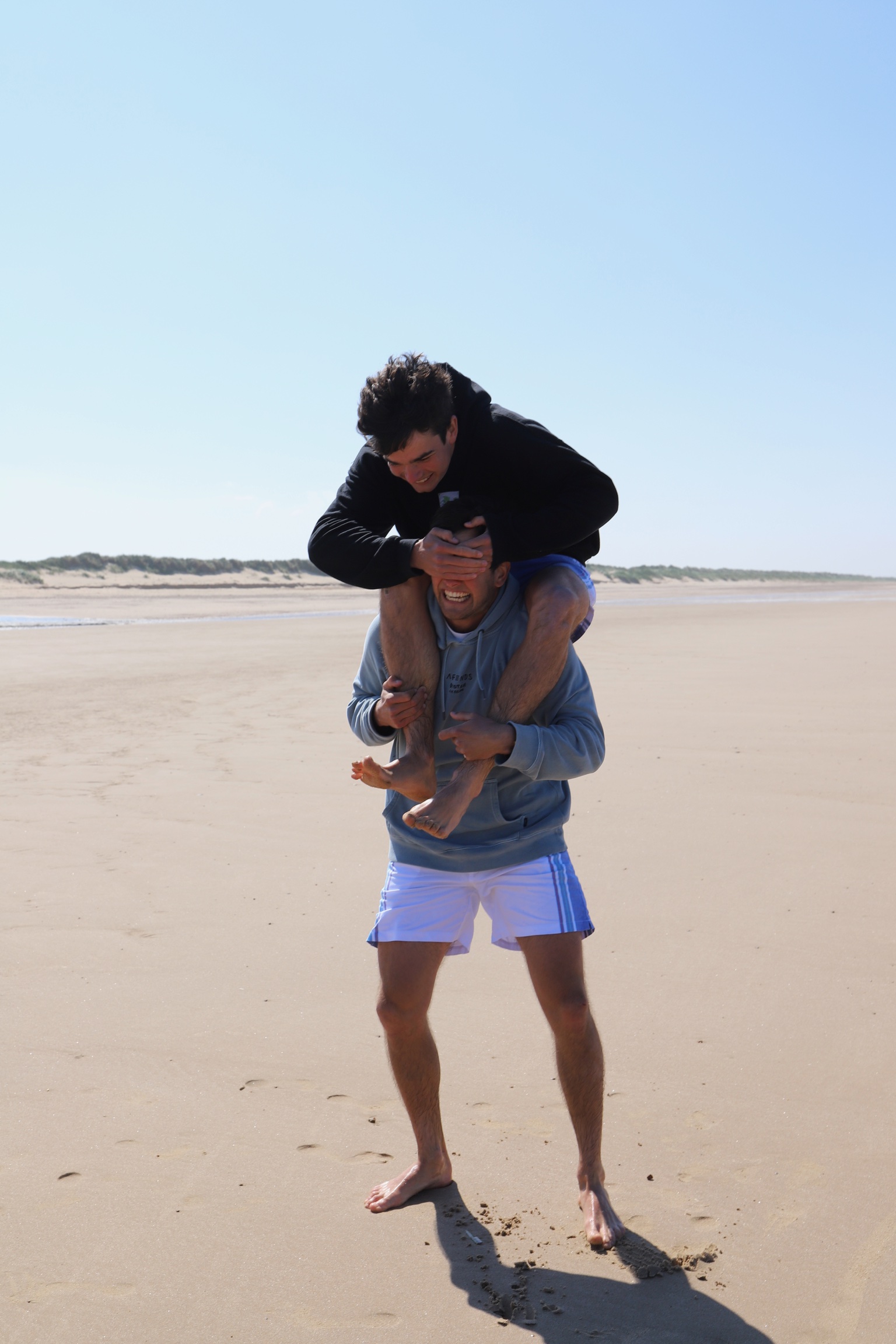 Piggyback Ride on the Beach