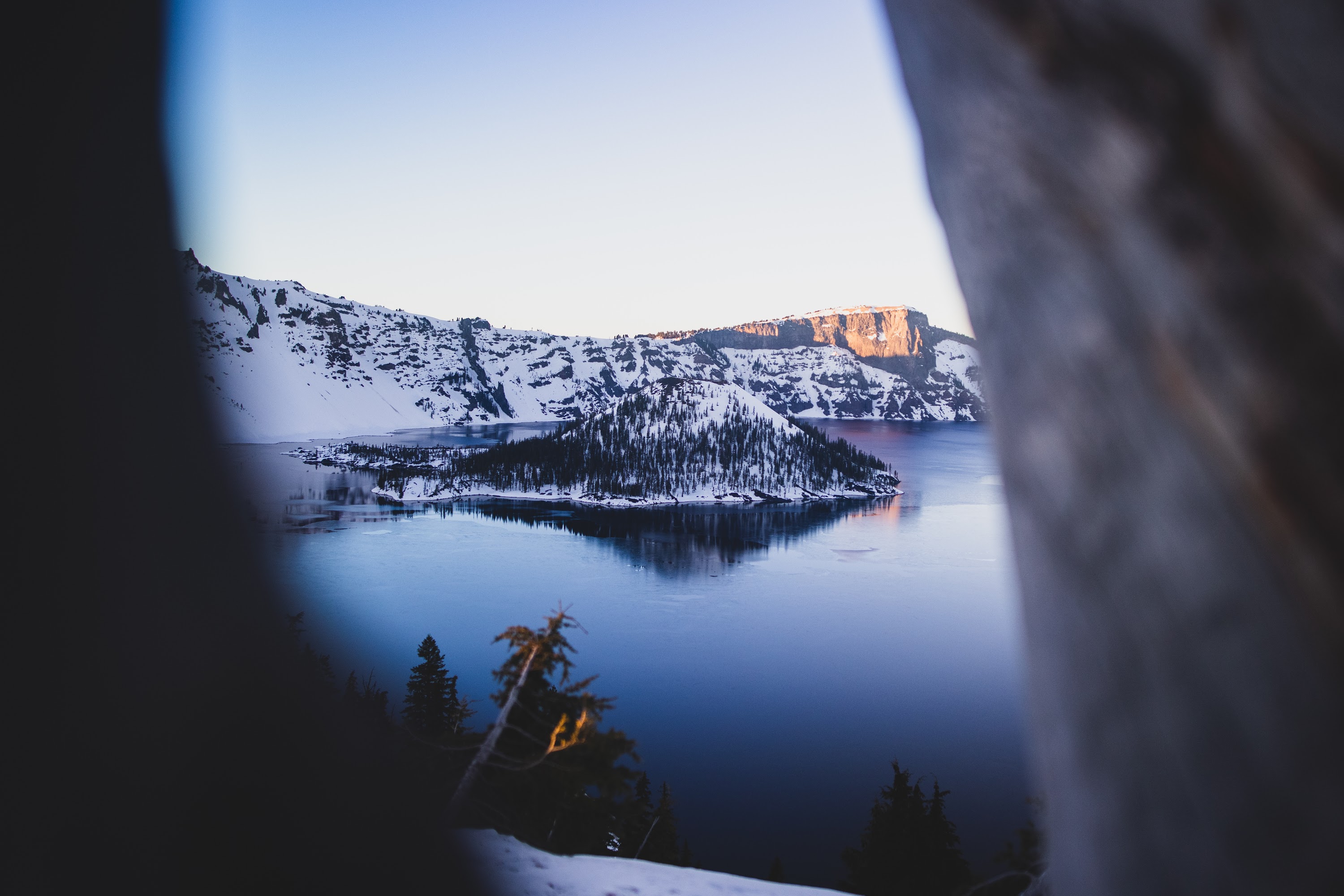 Crater Lake Winter Dawn Through Rock Frame