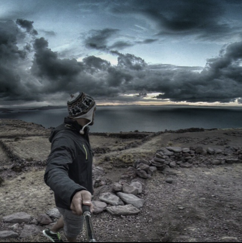 Self-Portrait on a Stormy Coastal Ridge