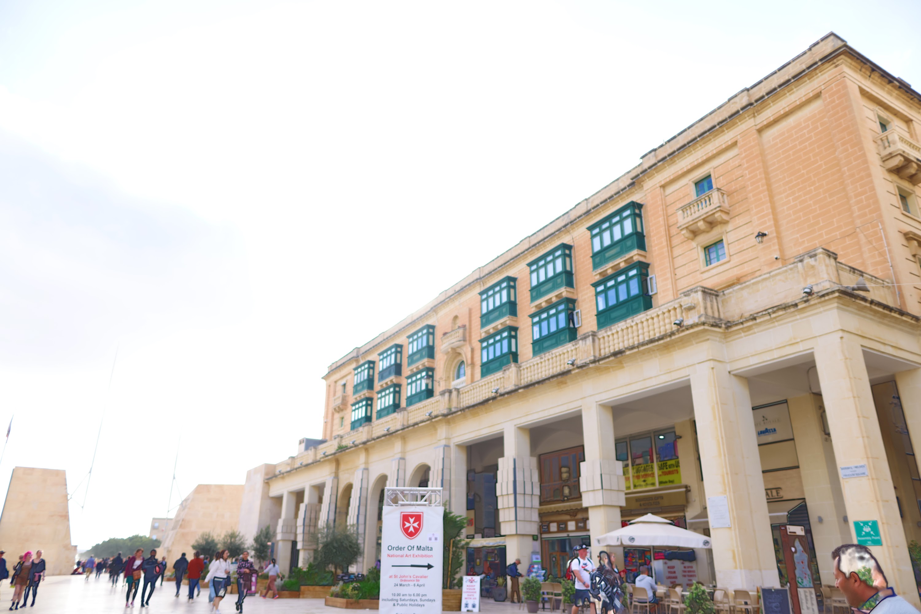 Valletta Streetfront with Traditional Maltese Balconies and Order of Malta Signage