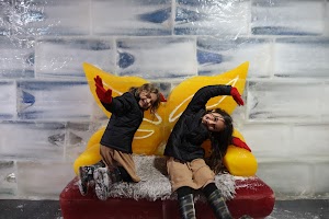Two Children Playing on Ice Sculpture