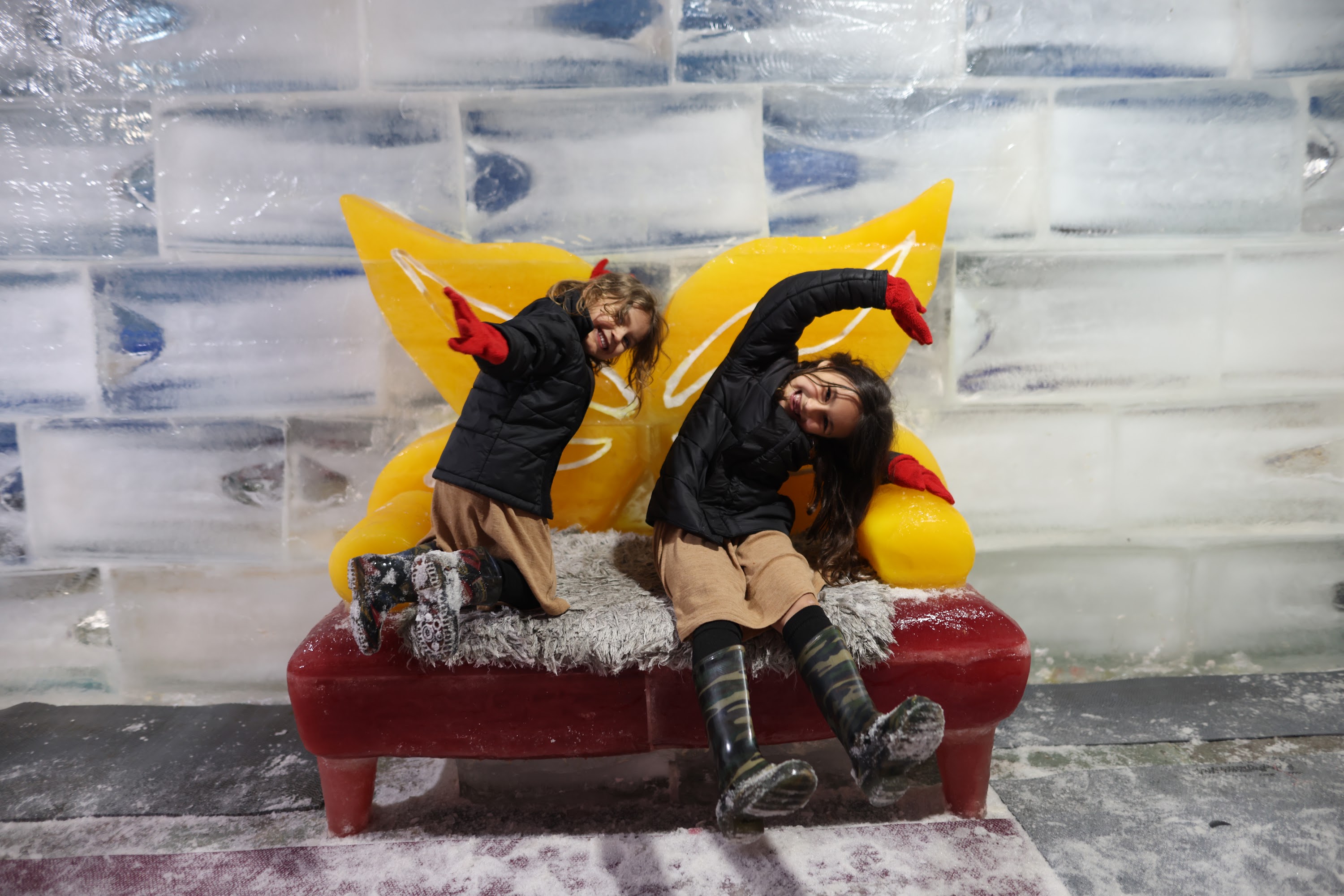 Children Playing on Ice Sculpture Sofa