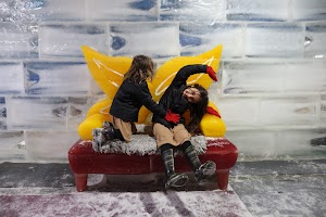 Children Playing on Colorful Ice Sculpture Bench
