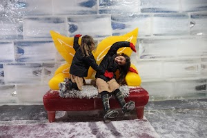 Children Playing on Ice Sculpture Sofa