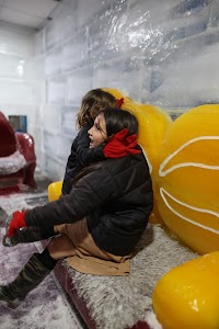 Children Playing on Ice Sculpture