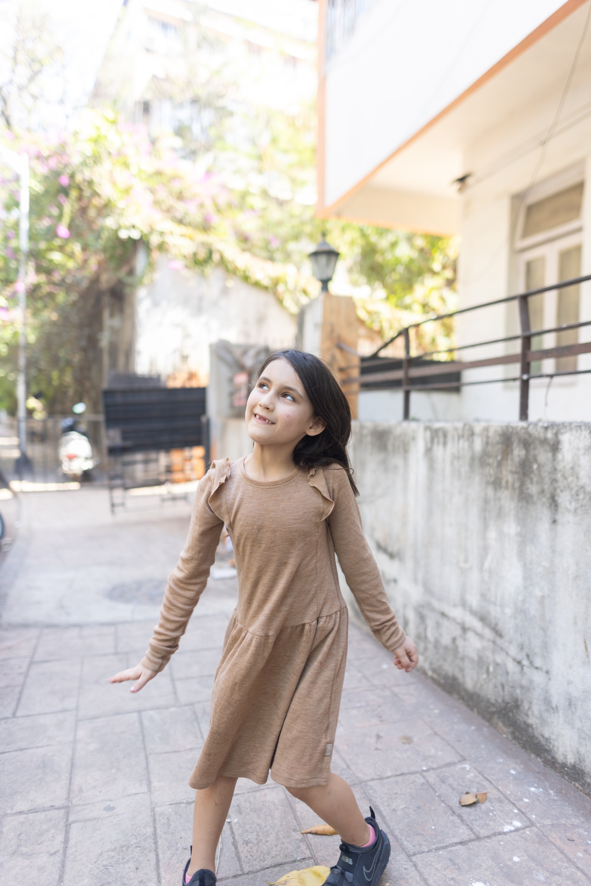 Girl Dancing in Urban Courtyard