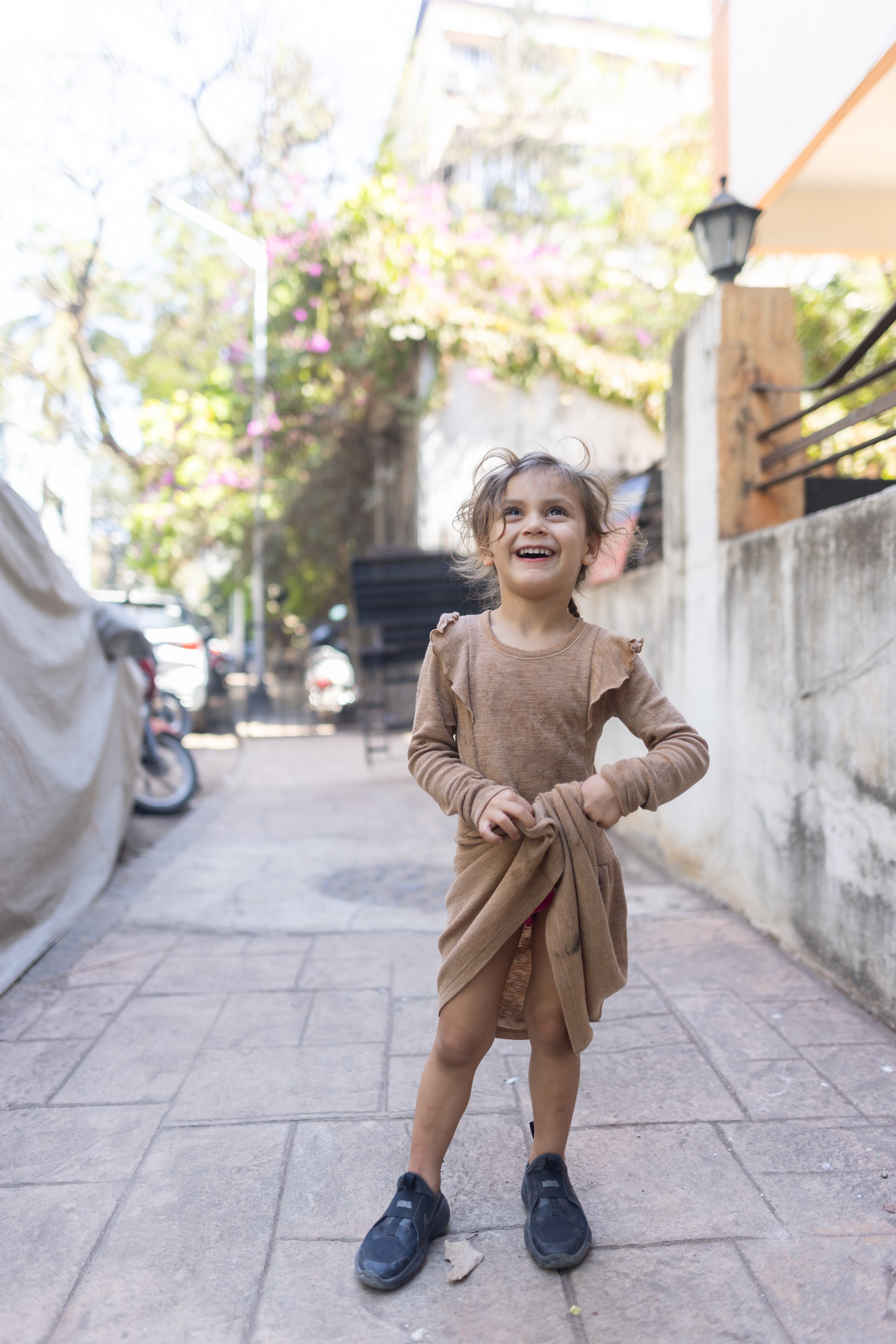 Happy Girl Laughing on Street