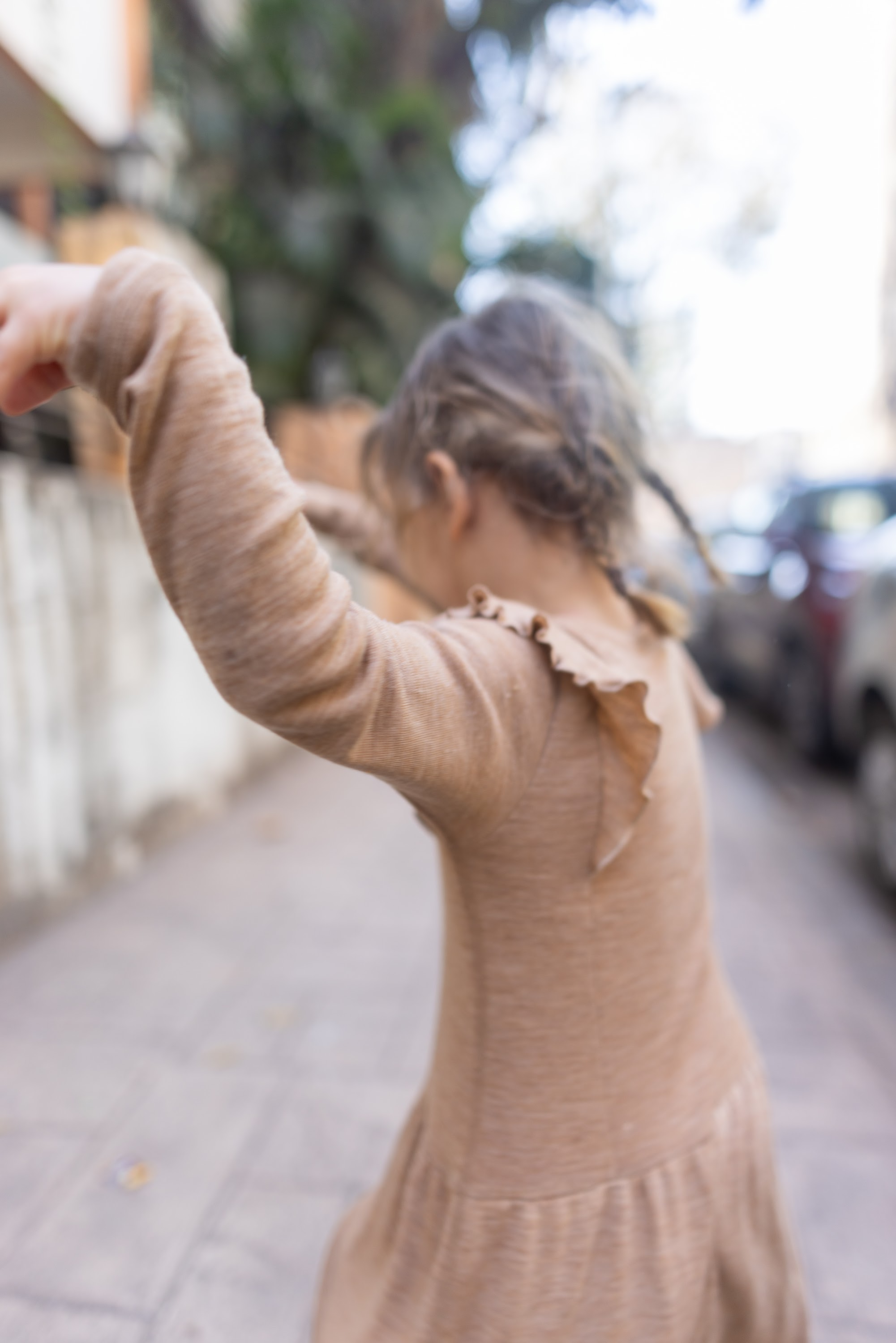 Child Dancing on Street