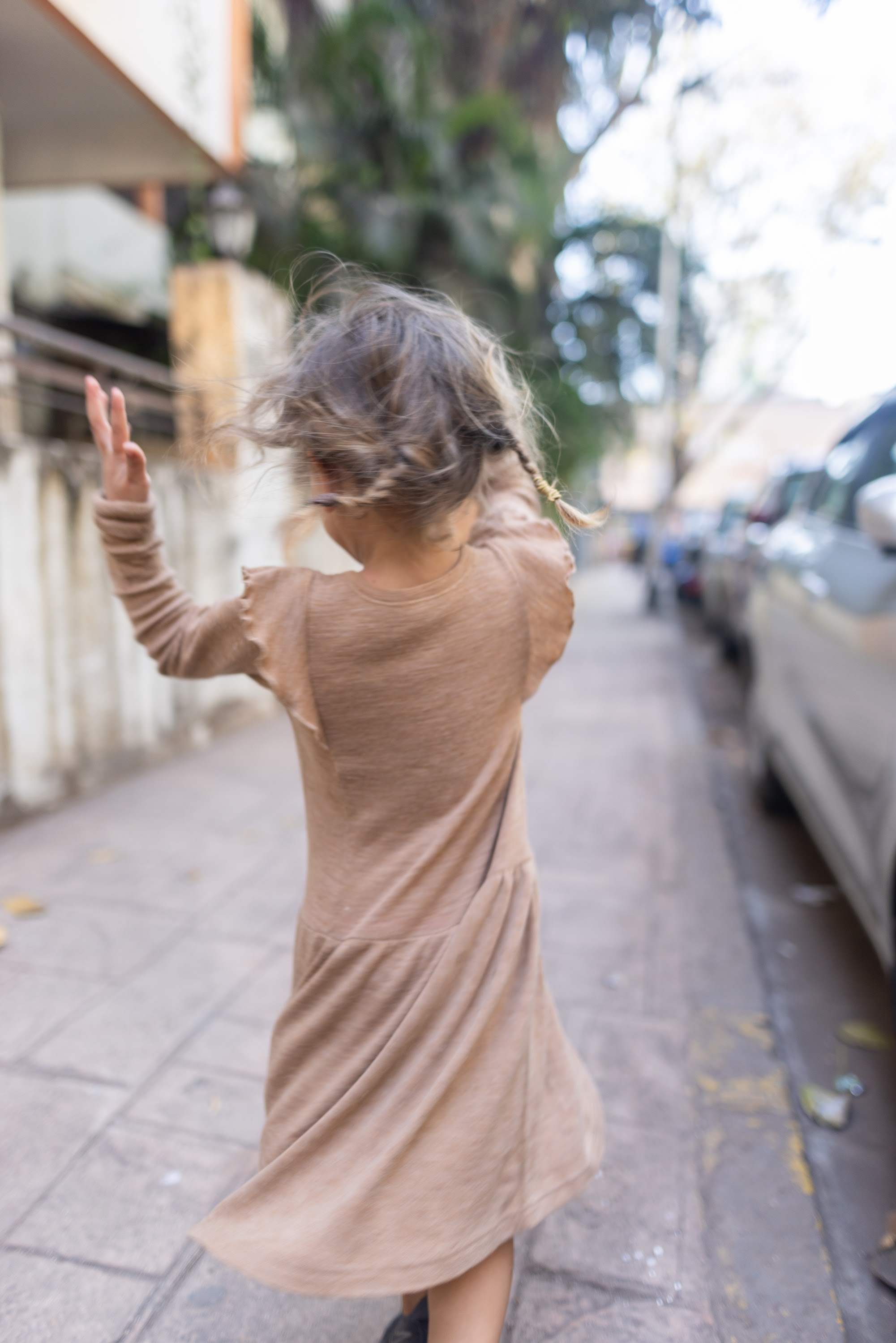 Child Running Down Street