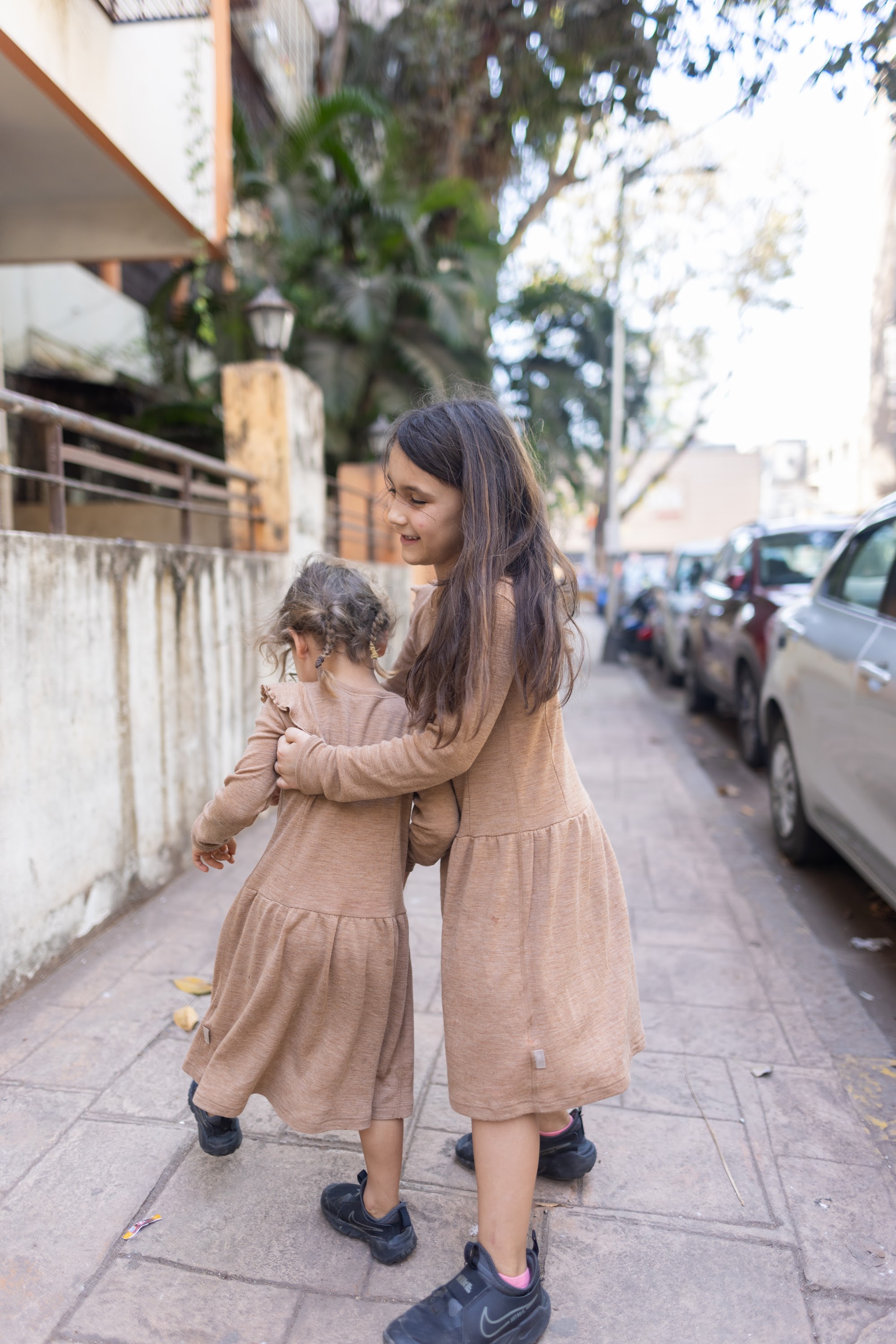 Sibling Walk in Matching Dresses